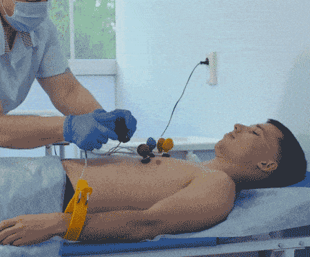 Performing an electrocardiogram on a patient. Taking care of your heart.
